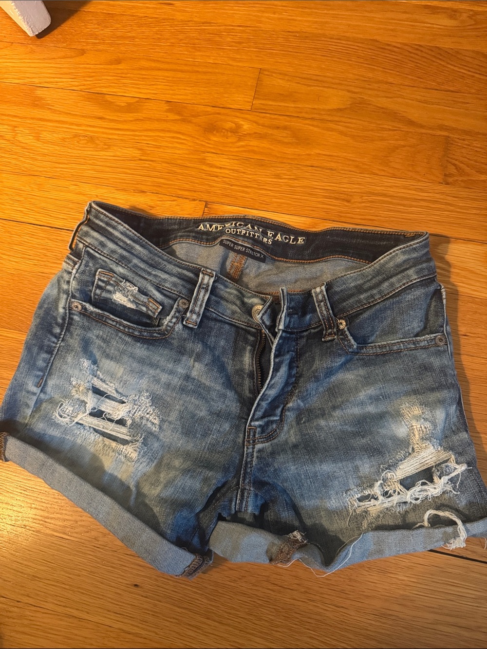 American Eagle Outfitters Distressed Rolled-Hem Denim Shorts - Blue